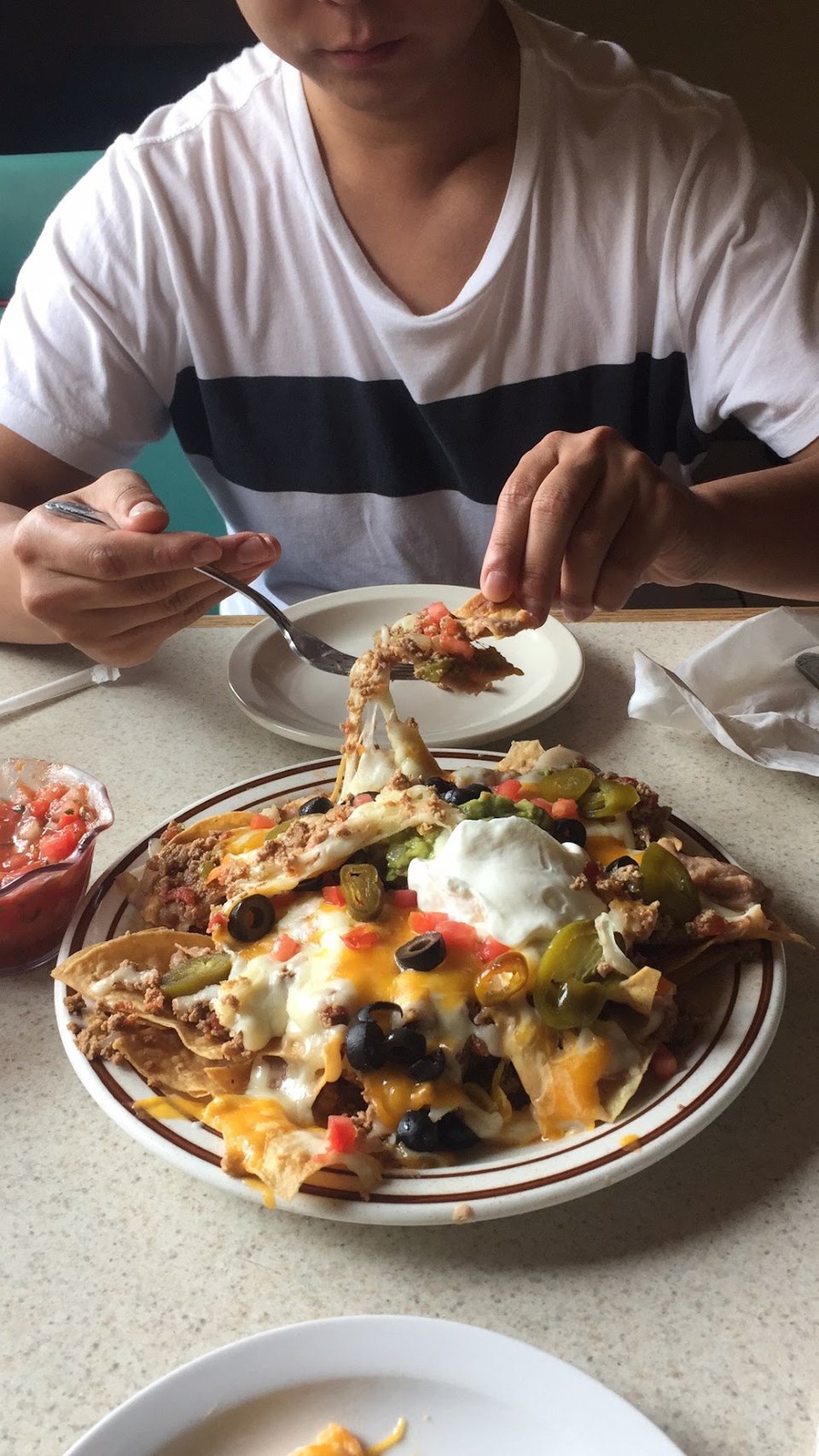 Menu page listing enchiladas and seafood salad.