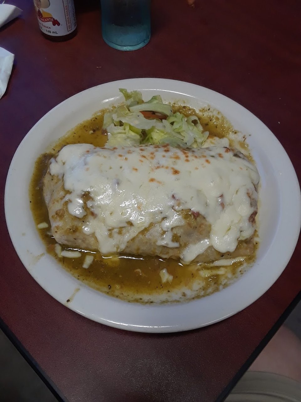 Menu page listing enchiladas and seafood salad.