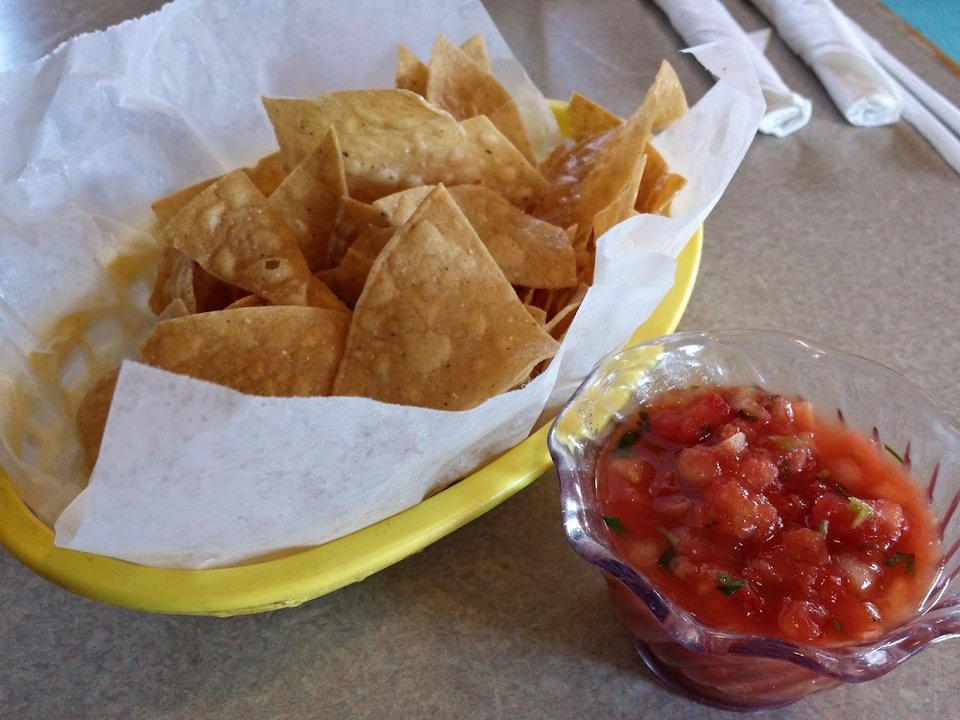 Printed menu with appetizers and salads.